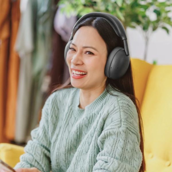 Logitech Zone Vibe Pro Woman Wearing Headphones